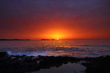 Waves crashing on Bombay Beach, Santa Eulalia, Ibiza, Balearic Islands, Spain. Europe.