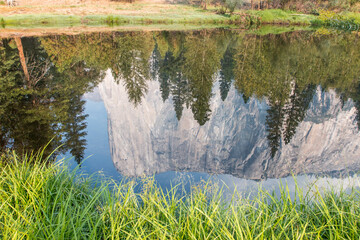 El Captain reflected on Merced river, Yosemite National Park, California, US