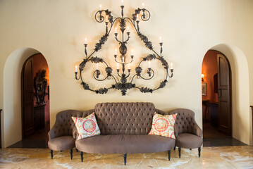 Lobby area with couch in a hotel in Tuscany, Italy.