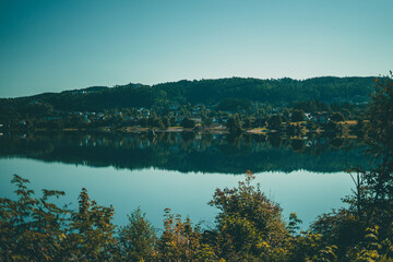 Beautiful lake at autumn in Norway reflecting