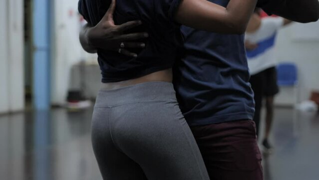 Dancers couple at Caribbean dance class