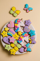 Fototapeta na wymiar Ginger cookies of different shapes in colored glaze