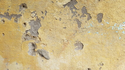 Background of old yellow painted wall texture