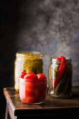 Fermented cherry tomatoes, cucumbers with chili