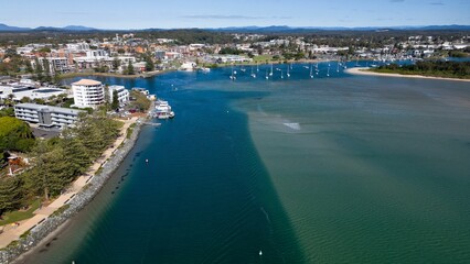 Aerial shot of Port Macquarie in Australia with a cloudscape in the background