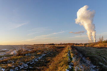 The lignite-fired power plant of Lippendorf near Leipzig on the edge of an opencast mine with white...