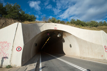 Tunnel on a road along the city of Volos, Greece