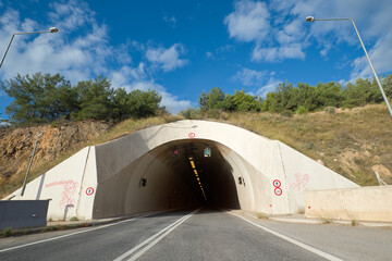 Fototapeta na wymiar Tunnel on a road along the city of Volos, Greece