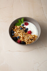 Breakfast muesli with berry in bowl food