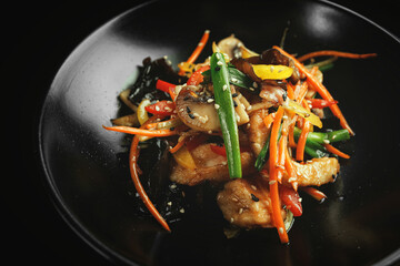Chinese style chicken with mushrooms and vegetables