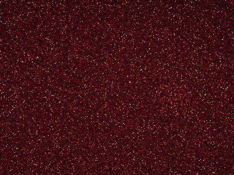 Dark Red glitter. Perfect holographic background or pattern of sparkling shiny glitter for decoration and design of Christmas, New Year, Valentine Day, 3d, xmas gift card or other holiday pictures.