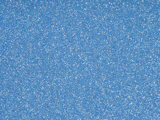 Extra soft blue glitter texture. Saturated shiny holographic background for Christmas desktop, holiday New Year, xmas seasonal decoration, social events, greeting and wedding invitation card element.