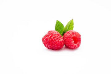 Ripe raspberry on the white background