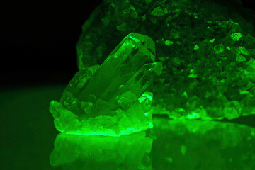 Quartz with mineral crystals against a black background