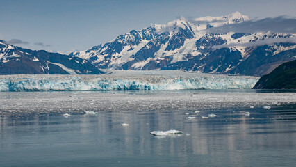 Snowy mountain icy peaks. Hubbard Glacier nature in Alaska, USA. Mountain glacier calving