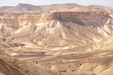 Gorgeous aerial drone top bird's eye view of incredible golden  desert mountains of tzin river. desert in Israel