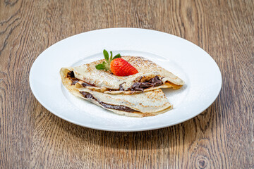 pancake with chocolate and strawberry