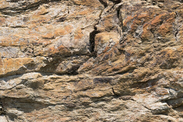 Rocky rock with cracks. Interesting background or texture.