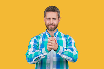 gesturing caucasian casual guy in studio. photo of caucasian guy wear checkered shirt.