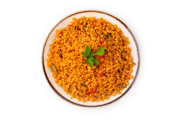 Traditional turkish bulgur pilaf with tomato sause in plate (Turkish name; meyhane pilavi)