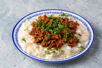 Turkish Ali Nazik Kebab with Yogurt, Minced Meat and Roasted Eggplant or Aubergine Kebap.