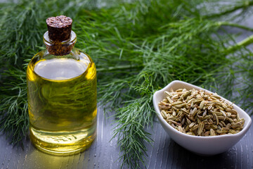 Fennel oil and fennel seeds - obrazy, fototapety, plakaty