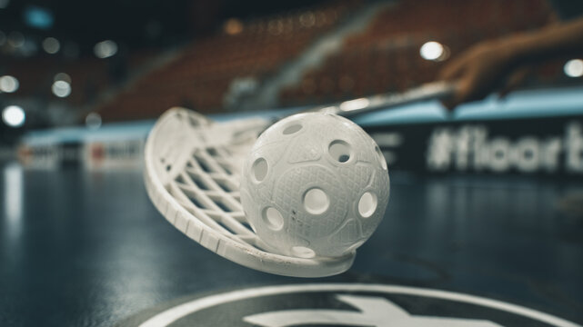 Floorball stick and ball