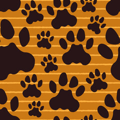 Fototapeta na wymiar Animal paw footprint seamless surface pattern. Wildlife camouflage print. Repeating trace silhouettes motif