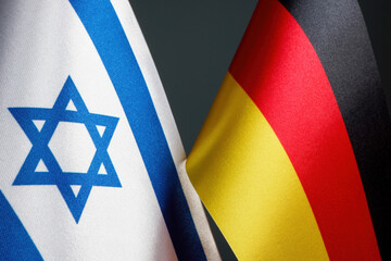 Flags of Germany and Israel as a symbol of diplomatic relations.