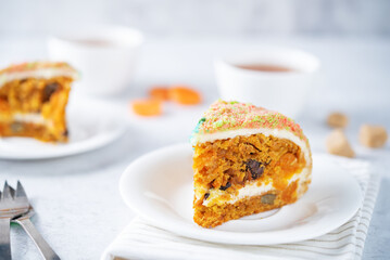 Carrot cake with cream cheese filling in a plate