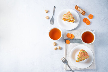 Carrot cake with cream cheese filling in a plate