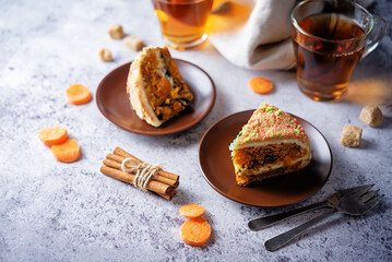 Carrot cake with cream cheese filling in a plate