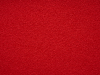 Bright red felt rough texture. Surface of felted fabric texture abstract background. Pattern for...