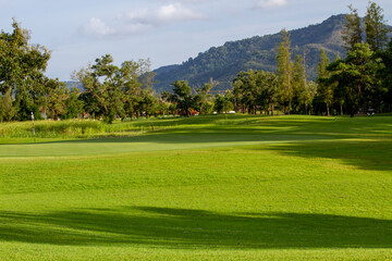 Lush golf fairways and greens in a tropical setting