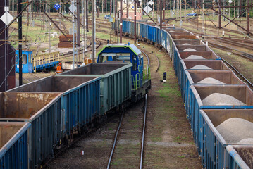 RAILROAD TRANSPPORT - A locomotive at work shunting coal wagons on a railway siding