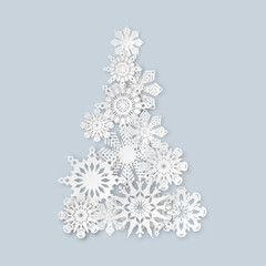 Christmas tree symbol from realistic paper snowflakes. Snow starts elements for winter holiday decor