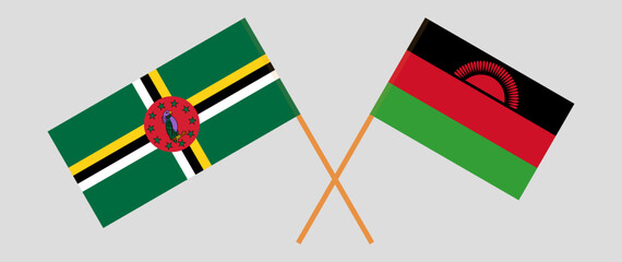 Crossed flags of Dominica and Malawi. Official colors. Correct proportion