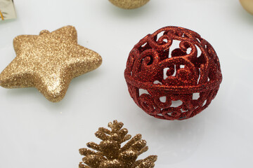several   christmas ornaments on white background