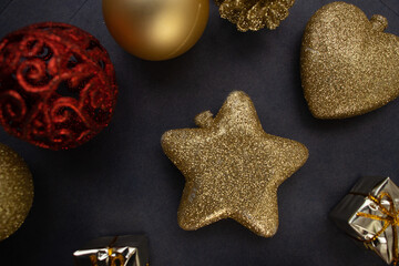 several  golden christmas ornaments on blue  background