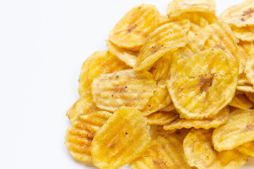 Banana slice chips on white background.