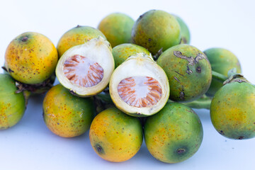 Betel nuts on white background.
