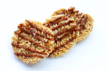 Rice cracker with coconut palm sugar on white