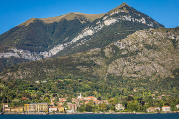 Fototapeta premium Tremezzo Village and mountain on Lake Como near Bellagio at sunset, Italy