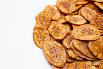 Banana chips on white background