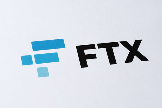 FTX Cryptocurrency Exchange logo printed on paper. Stafford, United Kindom, November 22, 2022.
