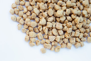 Textured soy protein on white background.