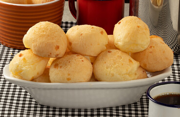 Brazilian cheese bread (pão de queijo) in white bowl.