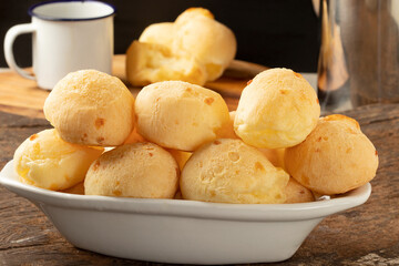 Focus on traditional cheese bread in bowl.