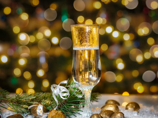  Champagne glass on holiday bokeh background,  New Year decoration, New Year concept