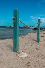 Rope Fence and Conch Shell Overlooking 5 Cays Beach Providenciales Turks and Caicos 